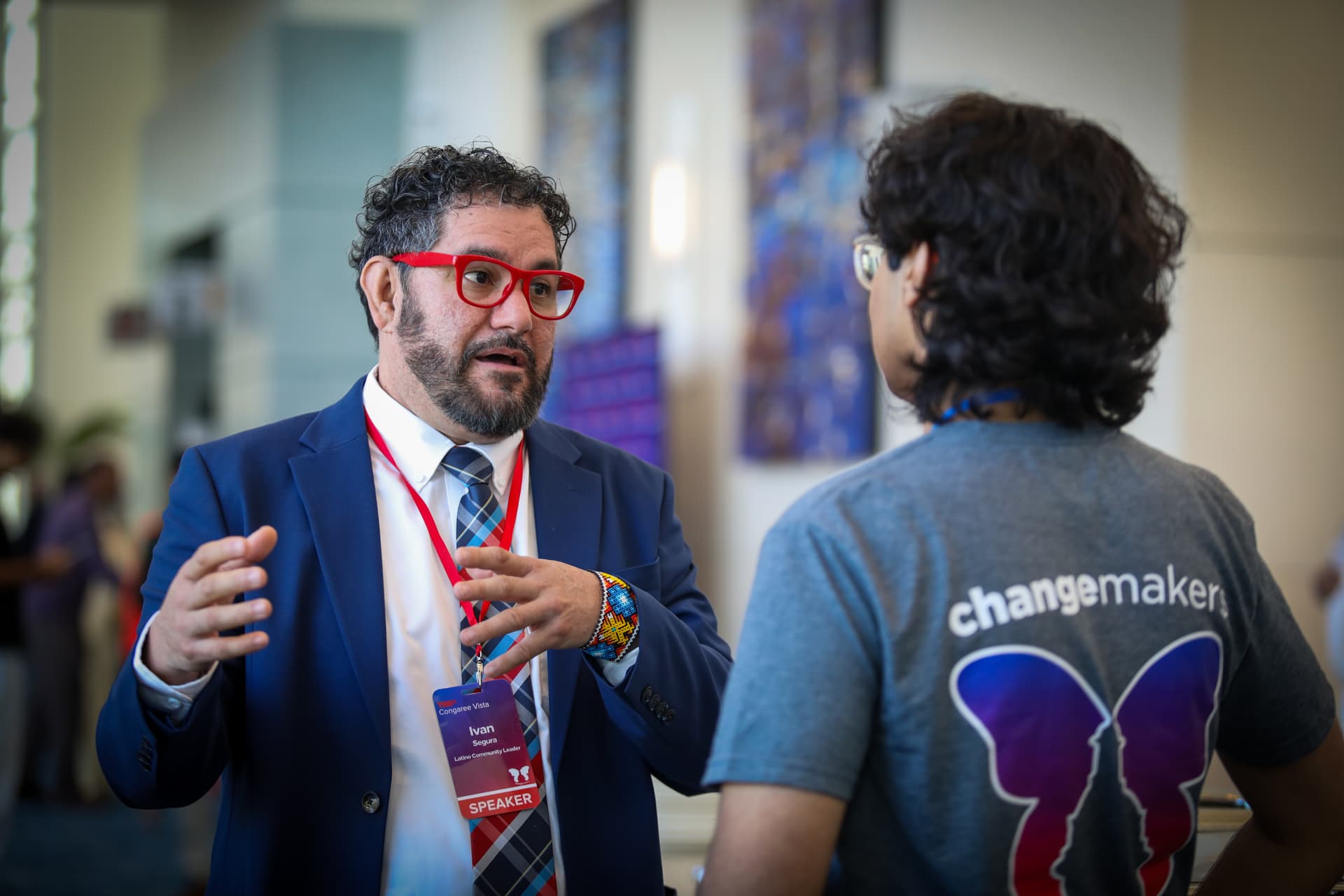 A TEDxCongaree Vista speaker networking with attendees after their talk