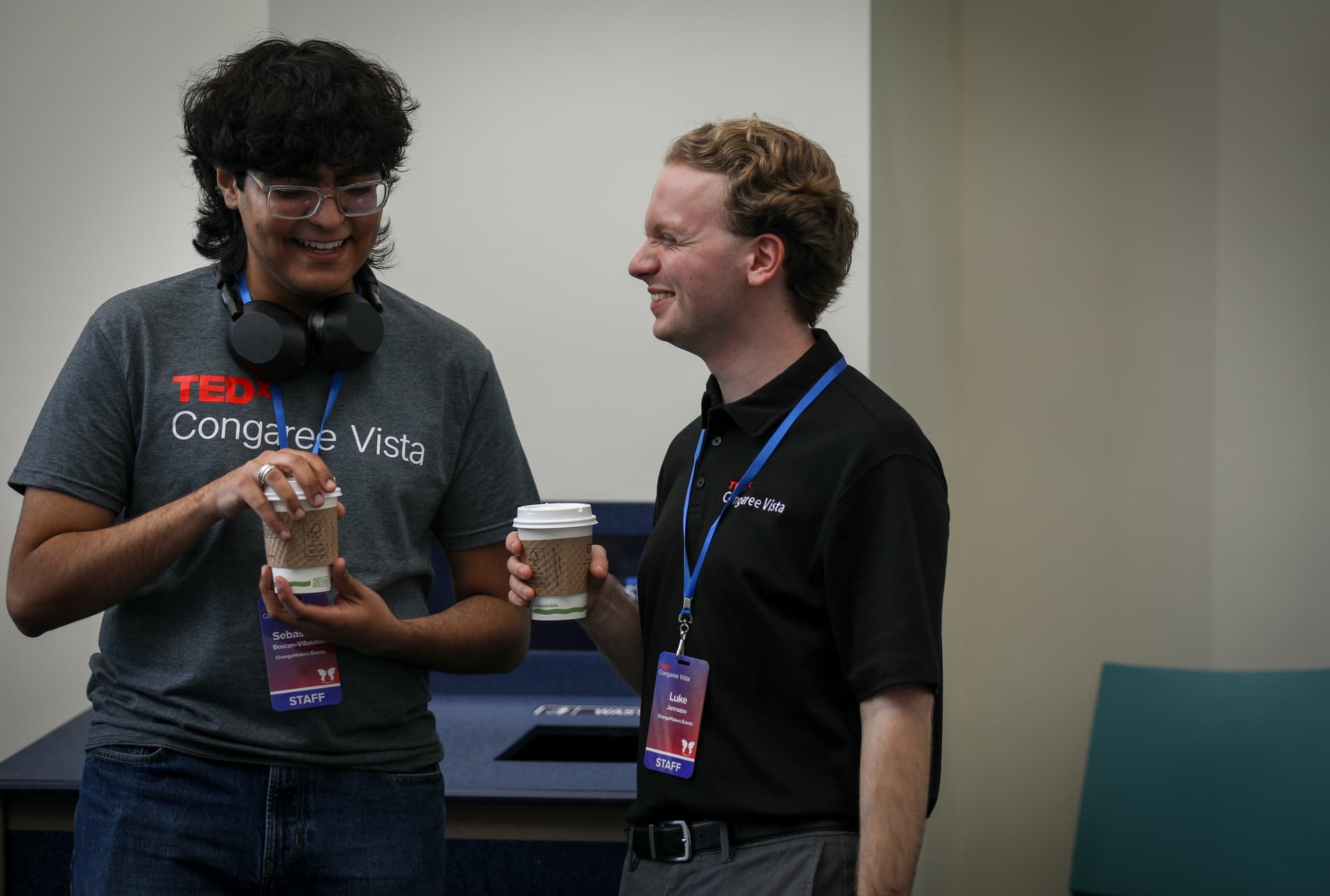 Inspire Columbia staff sharing a candid moment over coffee